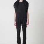 PF11_Look 14 Black stretch wool gabardine short jumpsuit with georgette pant leg, Black Tibetan goat wrap harness