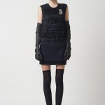 Pre-Fall Navy lurex basketweave cropped shell with crest, Navy wool double layer skirt with glitter canvas waist band and leather-piped hem