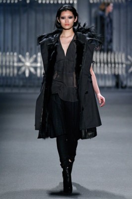 Charcoal mélange wool twill sleeveless oversized hooded coat with black detachable leather framed fox lining and black goat trim hood with leather drawstrings