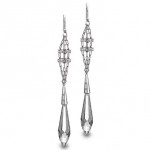 Diamond and platinum earrings by Wobito