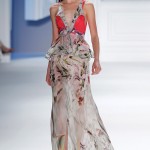 Magenta psychedelic printed chiffon tiered high-low gown with peplum drawstring belt