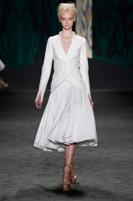 Look 1: White cotton canvas sleeveless cut away jacket over white cotton voile sleeveless wrap dress with dancing skirt and soutache embroidered bodice | Photography: Dan Lecca